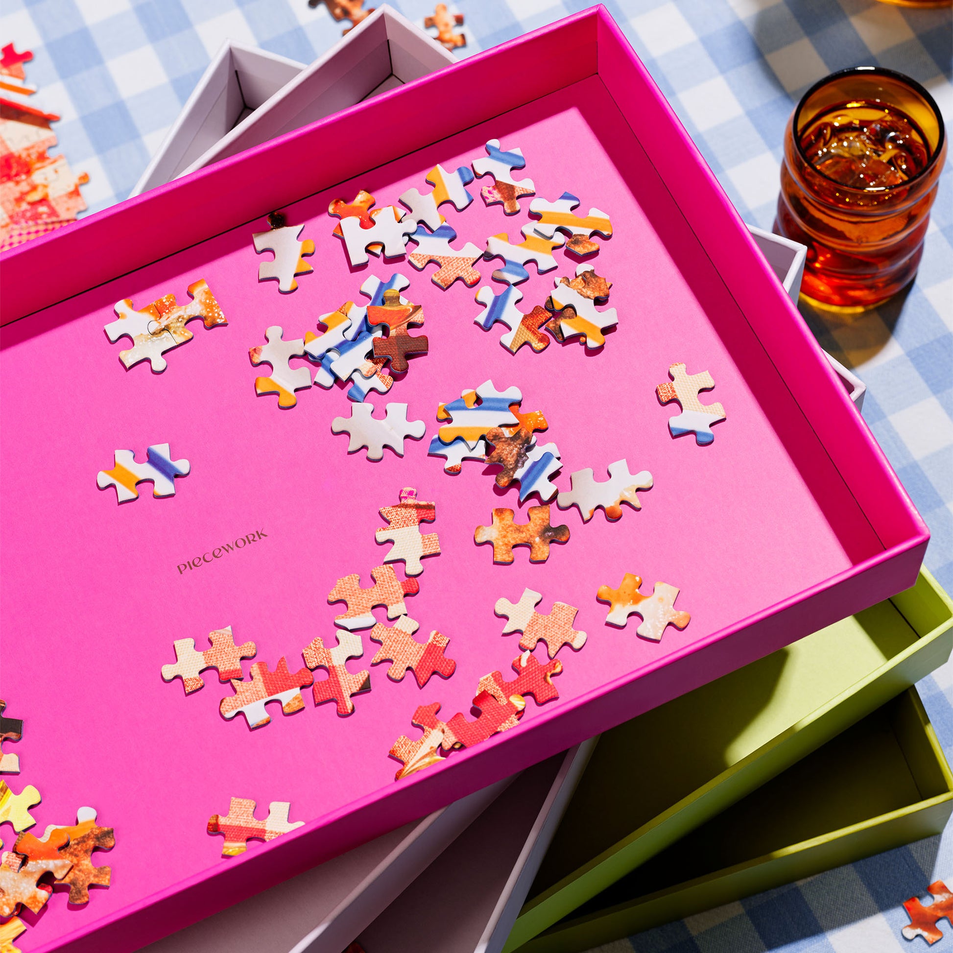 Puzzle Sorting Trays from Piecework Puzzles stacked on top of each other.