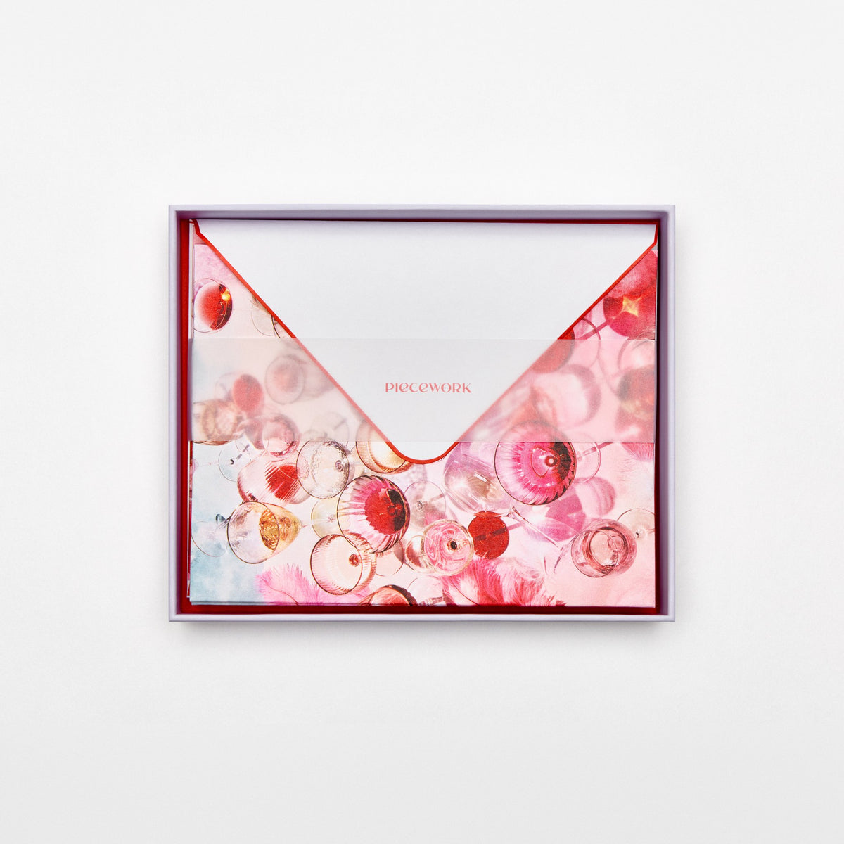 Piecework Cloud Nine Stationery Set: open lavender box of pink glassware notecards and envelopes under a vellum band