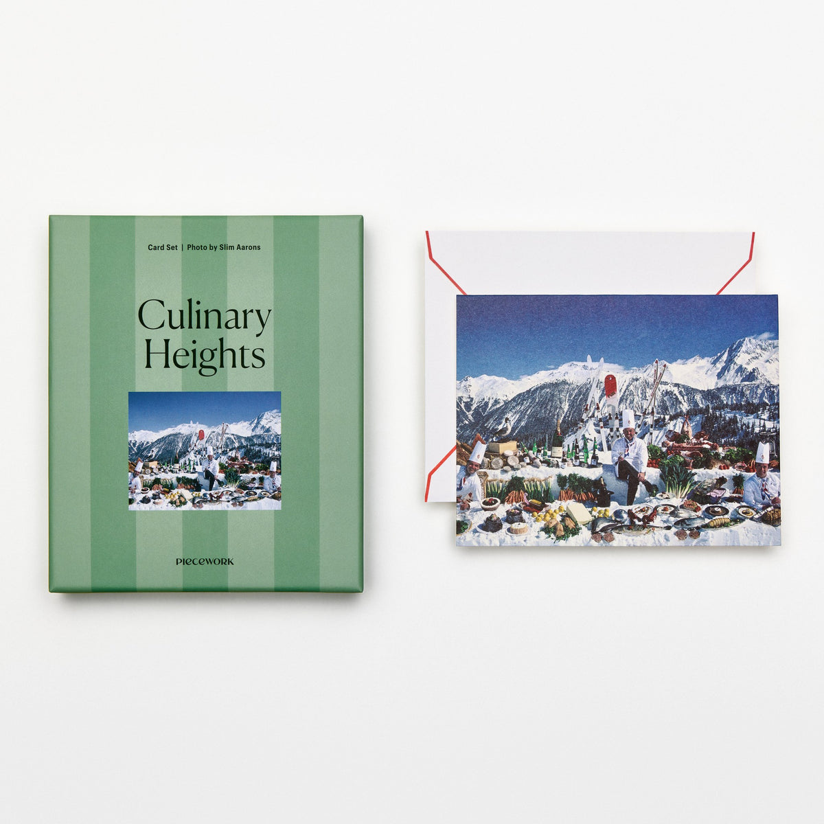 Piecework Culinary Heights Stationery Set: green-striped box and Slim Aarons card of a snowy alpine feast, plus envelope