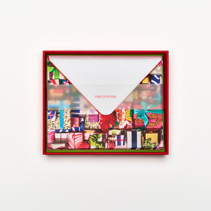 Piecework Fa La La La La Stationery Set: open red box of wrapped gift notecards and envelopes under a vellum band