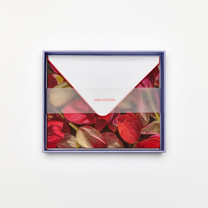 Piecework Spring Notes Stationery Set: open periwinkle box of red tulip notecards and envelopes under a vellum band
