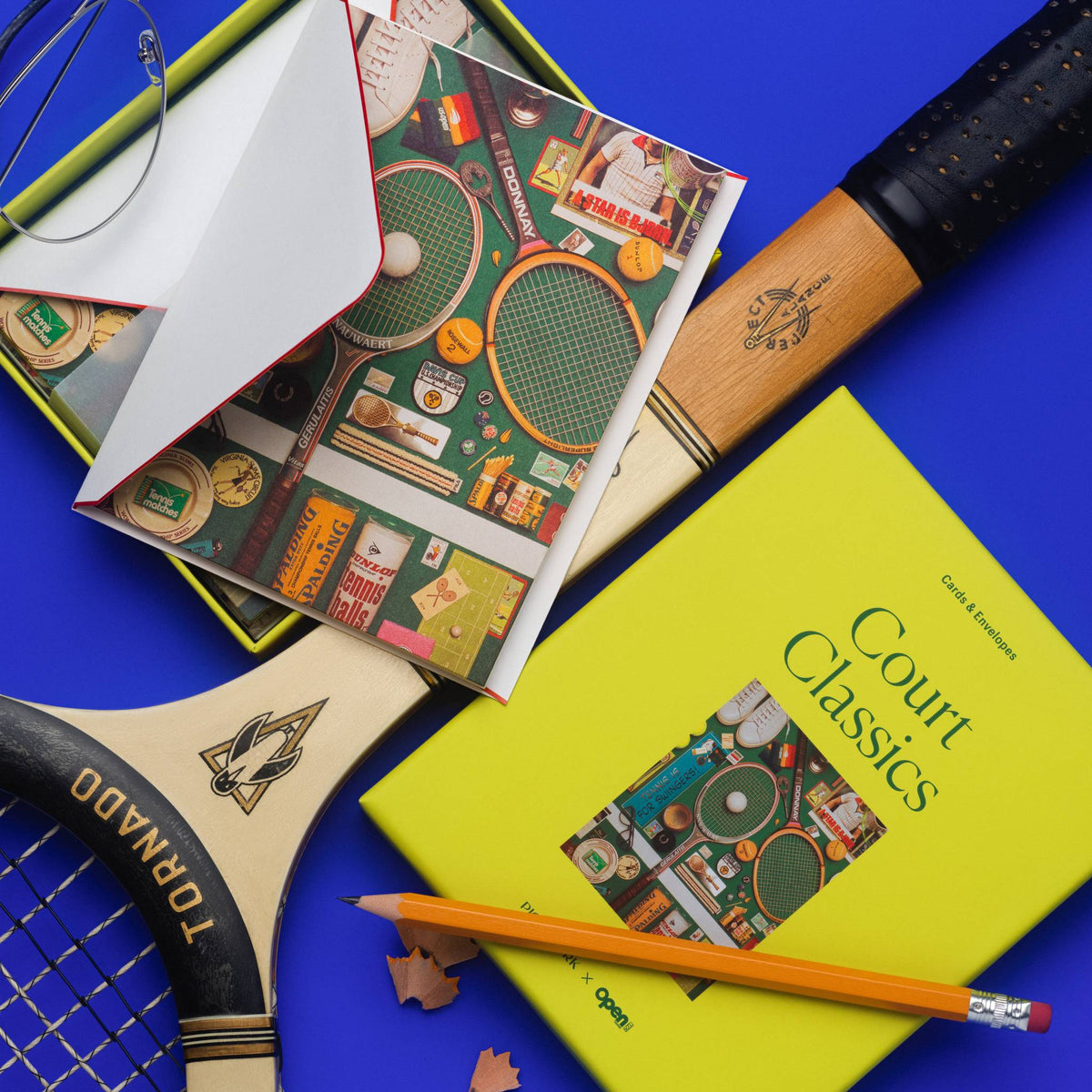 Piecework Court Classics Stationery Set: chartreuse box, notecards and envelope with vintage rackets and a pencil on cobalt