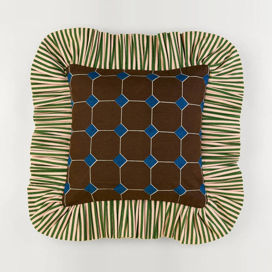 Jewel Stripe Ruffle Pillow front: brown tile print with blue jewels and a green striped ruffle