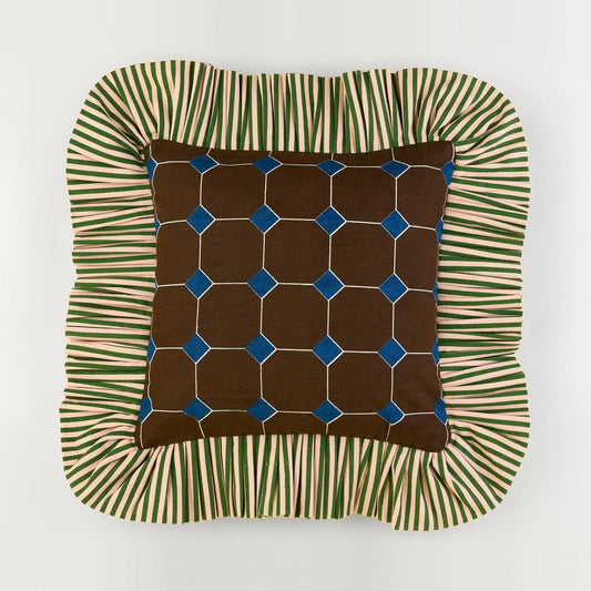 Jewel Stripe Ruffle Pillow front: brown tile print with blue jewels and a green striped ruffle