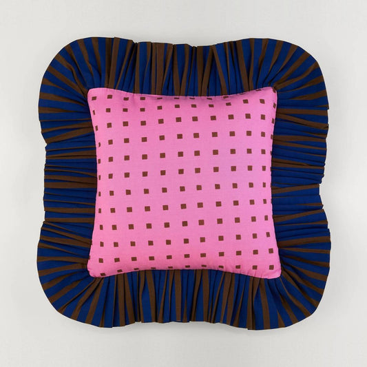 Pink Checks Ruffle Pillow front: pink check print with a navy and brown striped ruffle