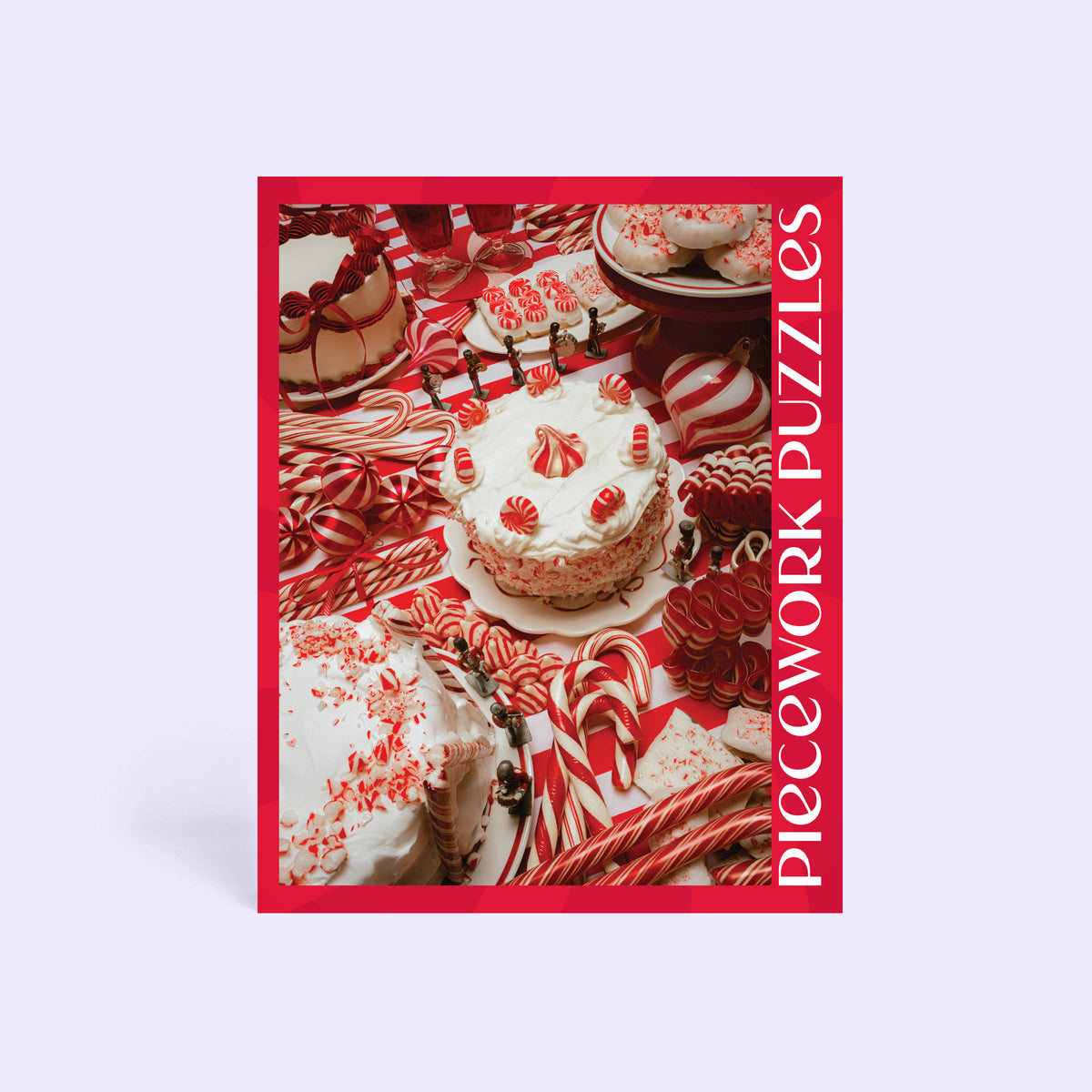 Back of the Peppermint Parade puzzle box showing the full red-and-white cake and candy cane puzzle image