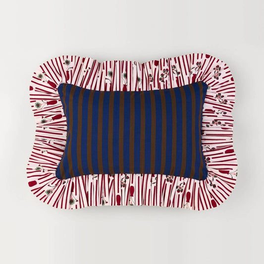 Striped Posie Ruffle Pillow front: navy and brown stripe with a red posie-stripe ruffle