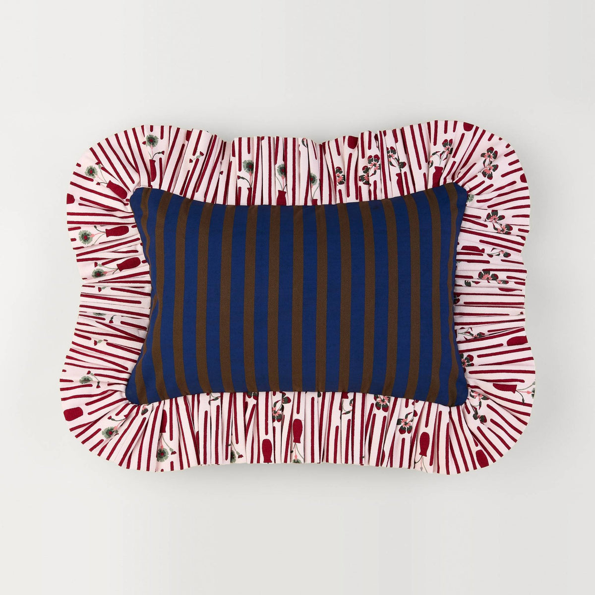 Striped Posie Ruffle Pillow front: navy and brown stripe with a red posie-stripe ruffle