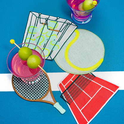 Cocktails with tennis-themed concktail napkins on a blue and white striped background