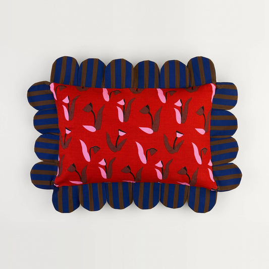 Tulip Stripe Petal Pillow front: red tulip print with a navy and brown striped petal edge