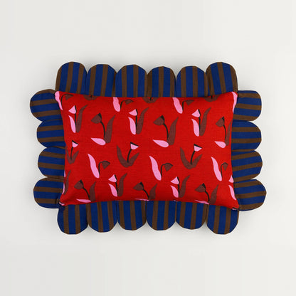 Tulip Stripe Petal Pillow front: red tulip print with a navy and brown striped petal edge