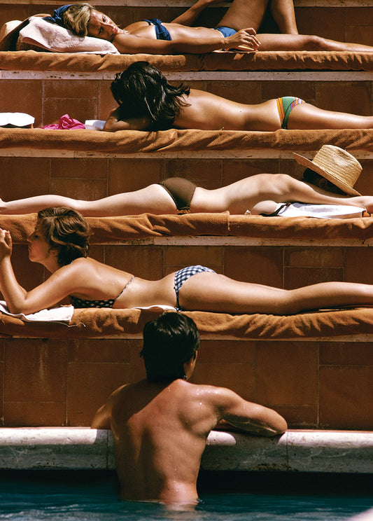 Puzzle art for 'Sun Basking', a photo by Slim Aarons showing sun bathers lounging.